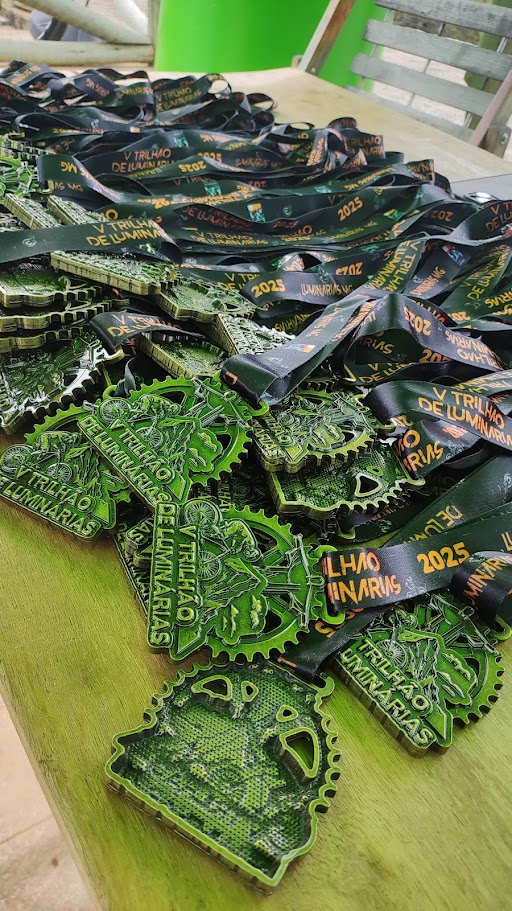 Detalhe da Medalhas que foi entregue aos participante do V Trilhão de Luminárias